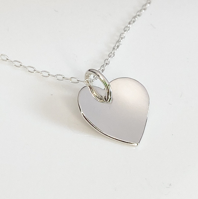 Curved sterling silver heart necklace